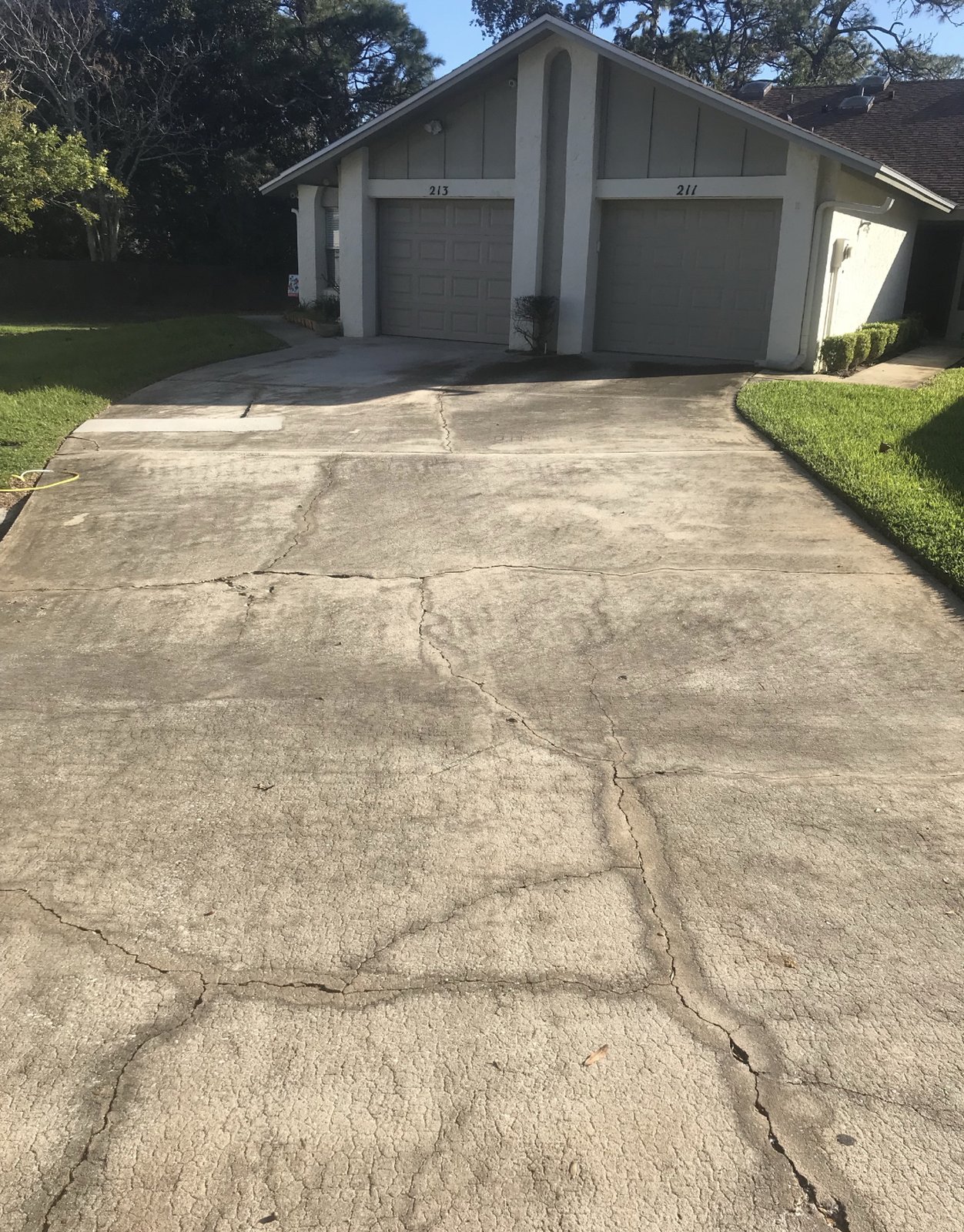 Before: Concrete driveway resurfacing
